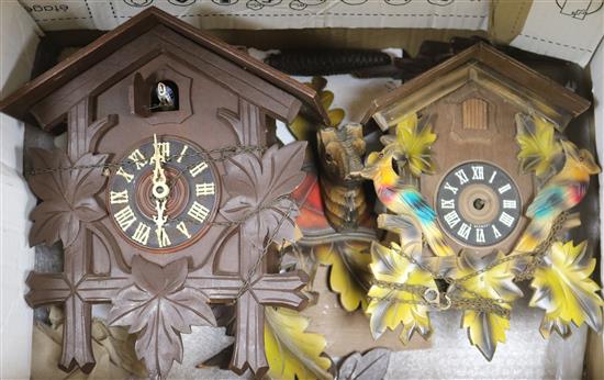 Two cuckoo clocks and parts